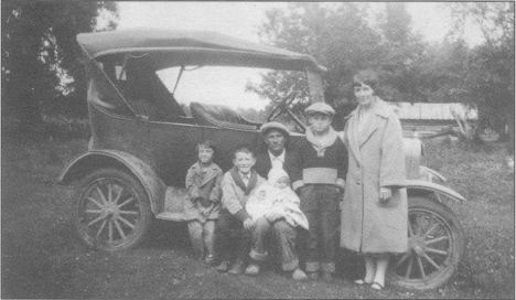 Rozycki family and their new car - 1928 - Blackduck Minnesota