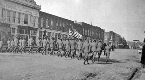 Home Guards marching on Main Street on victory day, Chatfield Minnesota, 1918