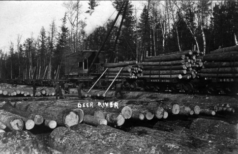 Loading logs on railroad, Deer River Minnesota, 1911