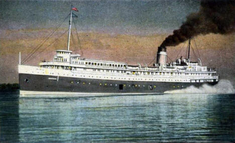 Steamer Hamonic leaving Duluth Superior Harbor at dusk, 1931