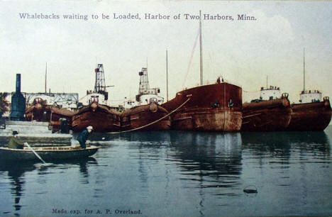 Whalebacks waiting to be loaded, Two Harbors Minnesota, 1910's