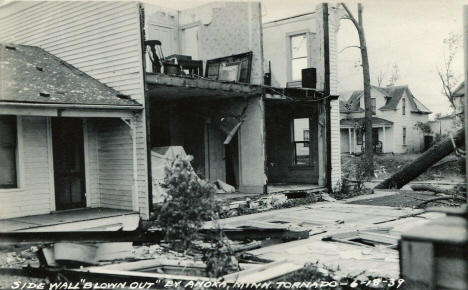 Side wall blown out by tornado, Anoka Minnesota, 1939