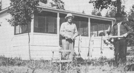 1920 summer vacationers catch a large northern.