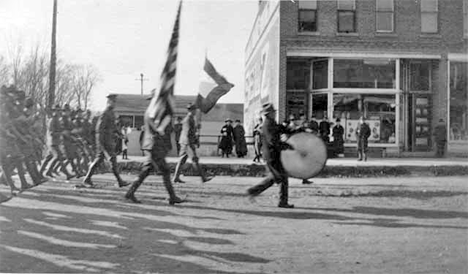 Home Guards marching on Main Street on victory day, Chatfield Minnesota, 1918