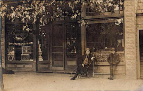 Sam Hodge in front of his Drug Store, Delavan Minnesota, 1906