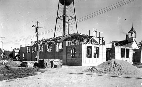 Building roof on Donnelly Community Hall, Stevens County, 1936