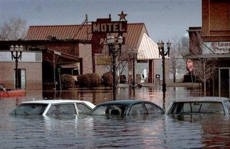 Abandoned cars submerged in downtown East Grand Forks, Minn., April 25, 1997