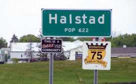 Halstad Minnesota population sign on US Highway 75