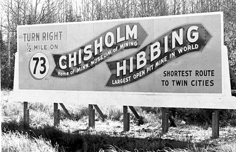 Chisholm/Hibbing billboard, near Highway 73, 1935