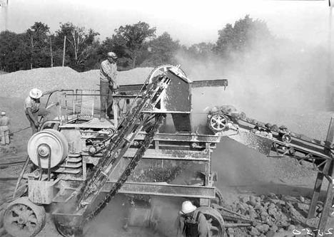 Portable rock crusher at work on Bronson Dam, Lake Bronson Minnesota, 1936