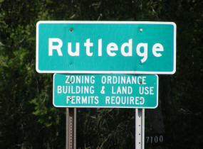 Rutledge Minnesota population sign on Highway 61