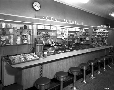 Soda fountain at Hall Drug, Mora Minnesota, 1953
