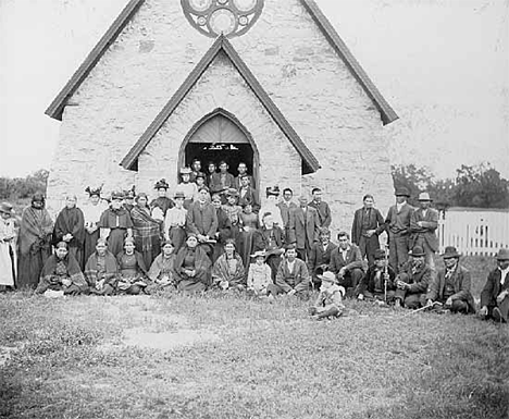 Group of Dakota, members of St. Cornelia's Church near Morton; Bishop Whipple seated.