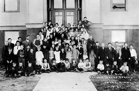 Pupils in front of the Oklee Consolidated School, Oklee Minnesota, 1915