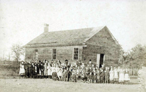 Teachers and pupils at the first school built by Father Francis Pierz, 1872