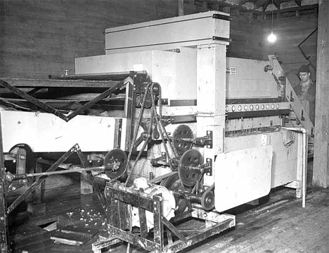 Potato washer in warehouse of O.J. Odegard, Princeton Minnesota, 1936