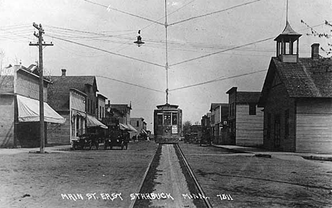 Main Street of Starbuck with streetcar and tracks added to view, 1920