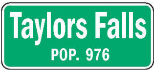 Taylors Falls Minnesota population sign