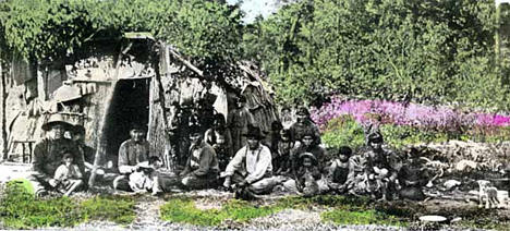 Indians in front of wigwam near Wahkon Minnesota, 1910