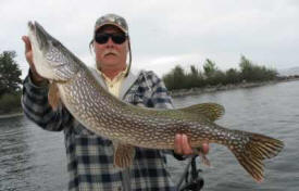 Kelly's Guide Service, International Falls Minnesota - Kelly with northern pike