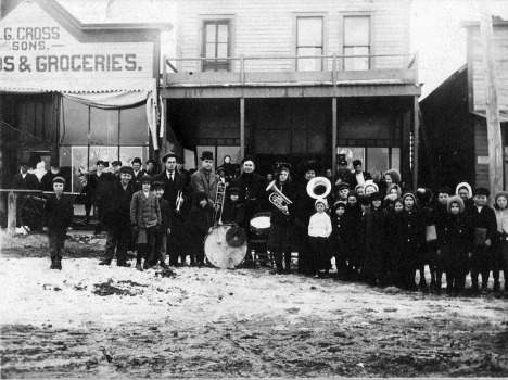 Band in front of Cross & Sons Grocery Store, Bellingham Minnesota, 1910