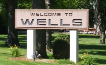 Welcome sign, Wells Minnesota