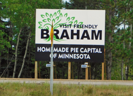 Visit Friendly Braham sign at junction of State Highways 65 and 107 near Braham Minnesota, 2018