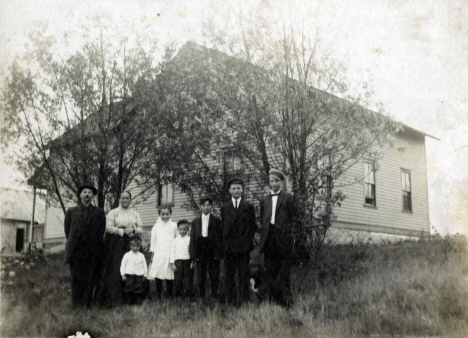 Alex Esko and family by their farm house on the banks of the Midway River, Esko Minnesota, 1910