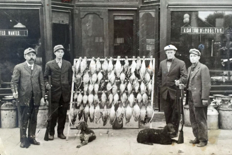 Hunters with pheasants, Madelia Minnesota, 1912