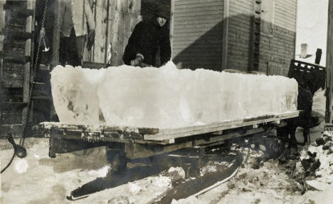 Putting up ice for the summer, Brownell's Meat Market, Ely Minnesota, 1920's