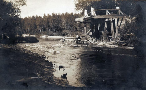 Remains of dam and bridge after washout, Fertile Minnesota, 1909