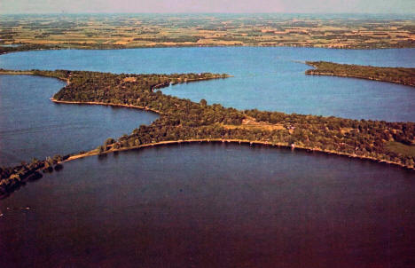 Aerial view of Lake Darling (lower left), Lake Carlos (upper left) and Lake L'Homme Deiu, Alexandria, Minnesota, 1970